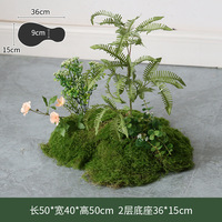 Plantes artificielles, plantes tropicales avec du mousse, arbre artificiel pour la décoration de restaurant