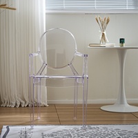 Chaise de salle à manger en plastique transparent de style nordique avec accoudoirs et dossier pour une utilisation moderne et simple à la maison dans le salon
