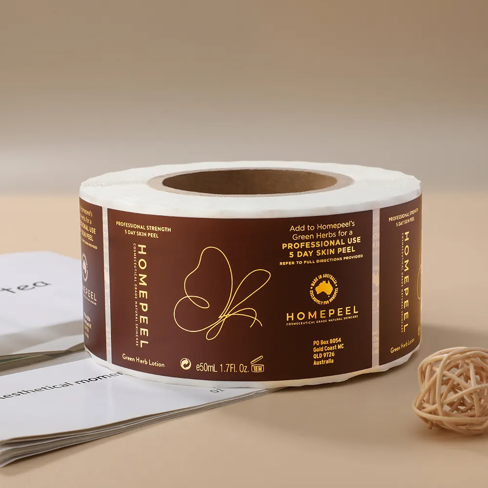 कस्टम लोगो डिजाइन मुद्रण रोल पैकेजिंग सोने लेबल चिपकने वाला व्यापार स्टिकर