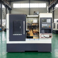 Tour CNC horizontal TCK40 à 3 axes de moyenne capacité avec banc incliné haute précision pour le tournage des métaux, fourni par l'usine