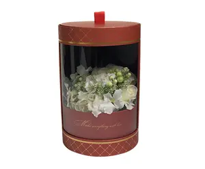 Ingrosso di lusso trasparente carta rotonda forma di cilindro oro che timbra Logo scatola di imballaggio di fiori per rose