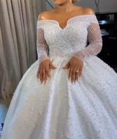Robe de mariée nigériane de luxe, style africain, faite main avec perles et dentelle, sur mesure, à manches longues, coupe princesse avec traîne cathédrale