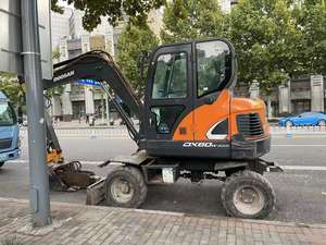 Excavatrice d'occasion 5 tonnes Doosan DX60W Excavatrice à roues Excavatrice d'occasion Doosan DX60W Mini taille Moteur YANMAR 4TNV94L à vendre - Product Image 3