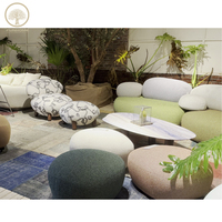 Fauteuil pouf moderne en tissu gris