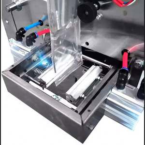 Machine d'emballage automatique pneumatique pour shampoing capillaire noir et colorant capillaire - Product Image 4