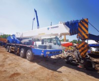 Grue sur camion TADANO GT-550E d'occasion, d'origine japonaise, facile à utiliser, capacité de levage de 55 tonnes, pompe moteur PLC, faible nombre d'heures de fonctionnement