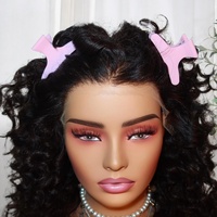 Perruque volumineuse bouclée en cheveux humains Remy, construction Lace Front avec ligne de cheveux naturelle, texture pleine et soyeuse pour coiffure de salon