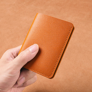 2025 nuevo Unisex geométrico corto impermeable PU plegable botón a presión pequeño para tarjeta de licencia de <span class=keywords><strong>conducir</strong></span> bolsa estudiante suave al por mayor - Product Image 1