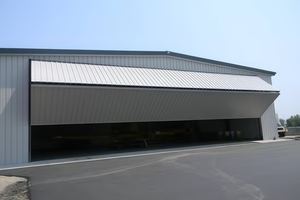 <span class=keywords><strong>Porte</strong></span> de <span class=keywords><strong>hangar</strong></span> verticale à double pliage à <span class=keywords><strong>prix</strong></span> d'usine, <span class=keywords><strong>porte</strong></span> de <span class=keywords><strong>hangar</strong></span> d'avion isolée avec système de déneigement automatique - Product Image 5