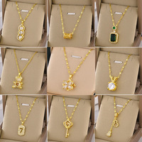 Collier en acier inoxydable 18 carats plaqué or de jour de fantaisie avec pendentif papillon bijoux de tour de cou de perle d'imitation de conception de diamant brillant