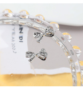 50 pièces de breloques pour ongles en alliage, motifs nœud papillon français et cravate 3D, ornements métalliques pour la décoration de manucure - Product Image 2