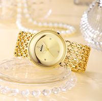 Montre à quartz de luxe pour femme, cadran vintage, résistante à l'eau 30M, bracelet ajouré en alliage, aiguilles mode ornées de strass