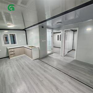 Maison conteneur portable 20 pieds extensible avec grande paroi vitrée et panneau mural en métal sculpté, couleur gris personnalisée pour bureau et maison - Product Image 3