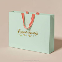 Sac en papier d'emballage pour bijoux, montres et maquillage, personnalisé et créatif, avec votre propre logo, sac cadeau de luxe à texture de pierre avec poignée en ruban