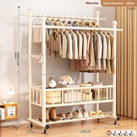 Porte-vêtements compact et élégant en métal à double étagère en maille, idéal pour les petits appartements et l'organisation de la maison