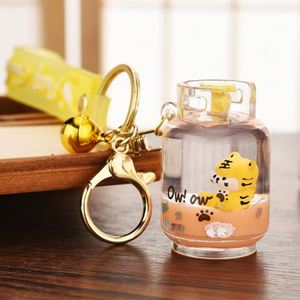 Creative <b>Cute</b> Gas Tank Little Tiger Liquid Keychain for Girl Gift Cartoon Floating Tiger Footprint Sequins Oild Doll Bag <b>Keyring</b> - Product Image 3
