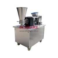Machine automatique à raviolis pour la fabrication d'empanadas, de pelmenis, de samosas, de pierogis, de wontons et de rouleaux de printemps