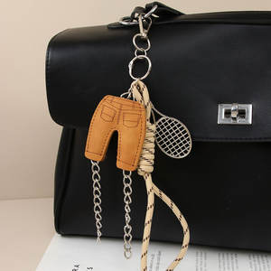 Mengda Miu Style Mode Mini PU <span class=keywords><strong>Pantalon</strong></span> Anglais Lettre <span class=keywords><strong>Raquette</strong></span> Sac Pendentif Accessoire Ins Étoile À Cinq Branches Tressé Porte-clés - Product Image 2