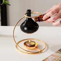 Diffuseur d'arômes créatif semi-artisanal en céramique dorée en forme de goutte d'eau, lampe à huile essentielle, chauffe-cire pour bougies d'intérieur