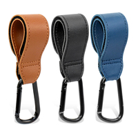 La carrozzina universale all'ingrosso del gancio del passeggino della Clip del passeggino ruota il gancio portatile della carrozzina degli accessori del gancio del carrello di 360 gradi