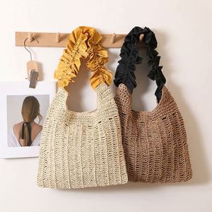 กระเป๋าฟางสานขอบลายเห็ด แฟชั่นฤดูร้อน 2025 สีพื้นใหม่ กระเป๋าสะพายไหล่สำหรับไปทะเล ชายหาด กลางแจ้ง - Product Image 1