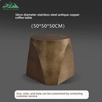 Table basse ronde moderne Wayon en métal, plateau doré de luxe avec base noire pour la décoration du salon