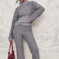 2025 hiver femmes décontracté 2 pièces ensemble couleur unie pull ample pull à col roulé tricoté pantalon avec Logo avant en gros