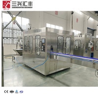 Ligne de production complète et automatique d'eau minérale et de boissons avec machine de mise en bouteille en verre à haute productivité