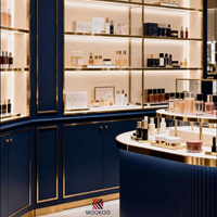 Vitrine de présentation de luxe sur mesure pour magasin de beauté - Unité de présentation en métal de haute qualité et verre transparent