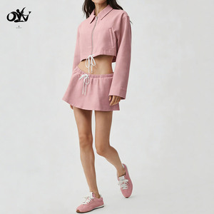 Ensemble deux pièces <span class=keywords><strong>sport</strong></span> pour femme de haute qualité, respirant, avec col montant, fermeture éclair, veste de survêtement et jupe, design décontracté 2-en-1 avec poches, vente en gros - Product Image 3