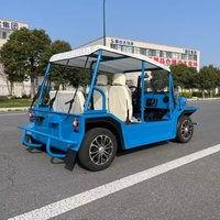 Voiturette de golf électrique vintage à quatre roues, mini véhicule utilitaire à cabine ouverte, bleue
