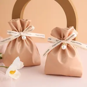 Großhandel bedruckter Aufbewahrungsbeutel für Geschenk Schmuck Hochzeit Süßigkeiten Organisator personalisierte PU-Zugbandstaubbeutel zur Werbung