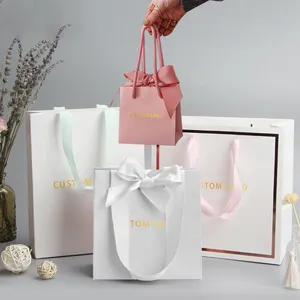 Custom Logo Luxury Gift Bag With Bow Boutique Retail Clothing Packaging Shopping Bag Bolsa De Papel Paper Bag With Logo