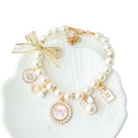 Collier en ruban luxueux et mignon pour chats et chiens, motif de dessin animé, clochette intégrée, confortable à porter, accessoire haut de gamme