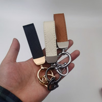 Porte-clés de voiture moderne à motif diamant, pendentif artistique, accessoire de mode créatif en alliage de zinc, cadeau pour couples, petit modèle