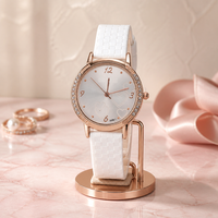 Montre analogique élégante pour femmes, boîtier en alliage, bracelet en cuir véritable, mouvement à quartz chinois, montre-bracelet de bureau pour femmes