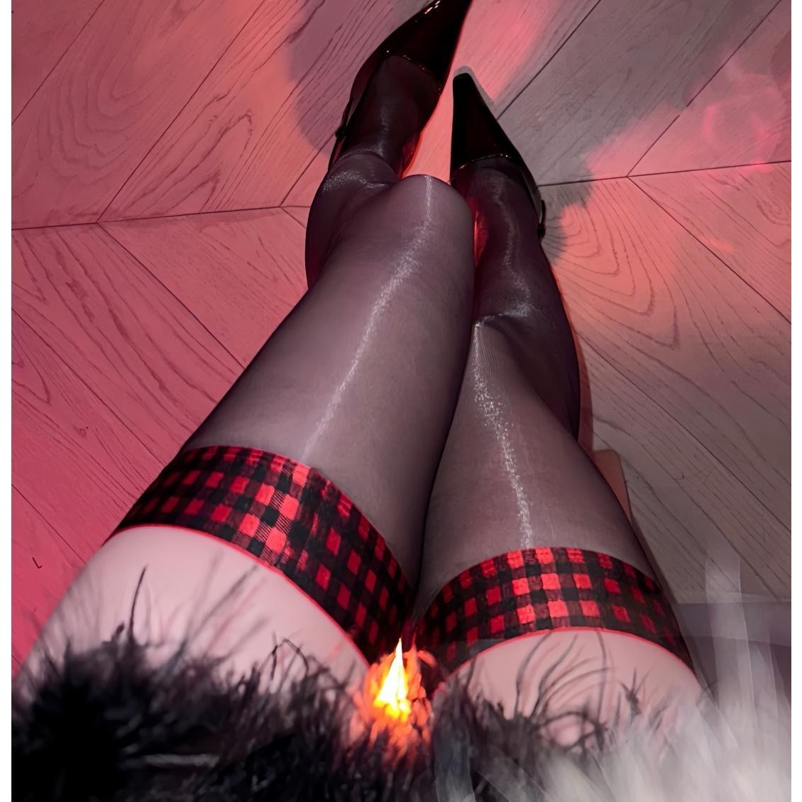Glossy black stockings with black and red trim