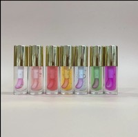 Huile à lèvres repulpante hydratante en profondeur, scintillante, au goût fruité, en pot blanc, cosmétique à marque privée