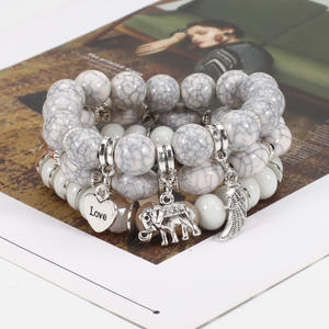 Joyería de Moda, Juego de Pulseras con Dijes de Elefante y Alas de Marfil, Regalo Unisex, Hecho en China - Product Image 4