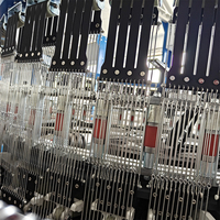 Machine à tisser circulaire à 4 navettes pour tissu de sacs tissés en raphia PP, avec un design compact et une haute efficacité