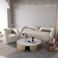 Canapé-banc 3 places en bouclette crème, design moderne sculptural avec bras tubulaires en U, pour salon, hôtel, vente en gros, OEM, sur mesure.
