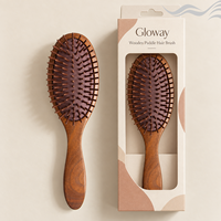 Brosse à cheveux ovale en bois brun de haute qualité OEM, brosse démêlante et massante en bois naturel pour les soins capillaires quotidiens
