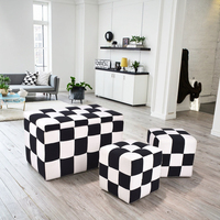 CAELFORD Pouf de rangement en tissu noir et blanc avec structure en bois, repose-pieds moderne, tabouret, disponible en OEM pour salon et maison