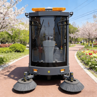 Machine de balayage industrielle pour l'extérieur, le jardin, la route et le sol, idéale pour le nettoyage des parkings et des feuilles, avec une conception de conduite facile à utiliser.