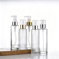 Flacon pompe à lotion rond en verre givré transparent de 60 ml, 80 ml, 100 ml avec bouchon supérieur noir, or, argent, logo personnalisé, utilisation cosmétique
