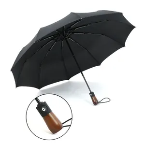 10k weerbestendig custom houten handvat triple opvouwbare paraplu