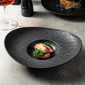 Jiujiuju Wholesale Upscale Restaurants Hotel Western Food Porcelain Dinnerware 10"12"Unique Oval Soup luxury Black Plate Sets