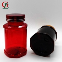 Bouteille de pilules octogonale en PET 200/250/450cc personnalisée en usine Bouteilles de capsules de forme unique avec bouchon mental pour une utilisation pharmaceutique