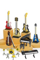 Série de blocs de construction en plastique, instruments de musique (piano, guitare), petite table de présentation, micro-granules, jouets DIY pour bébés, export