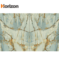 Vente en gros en usine dalle de grande taille carrelage en porcelaine design populaire aspect marbre dalles de pierre frittée très brillantes pour revêtement mural